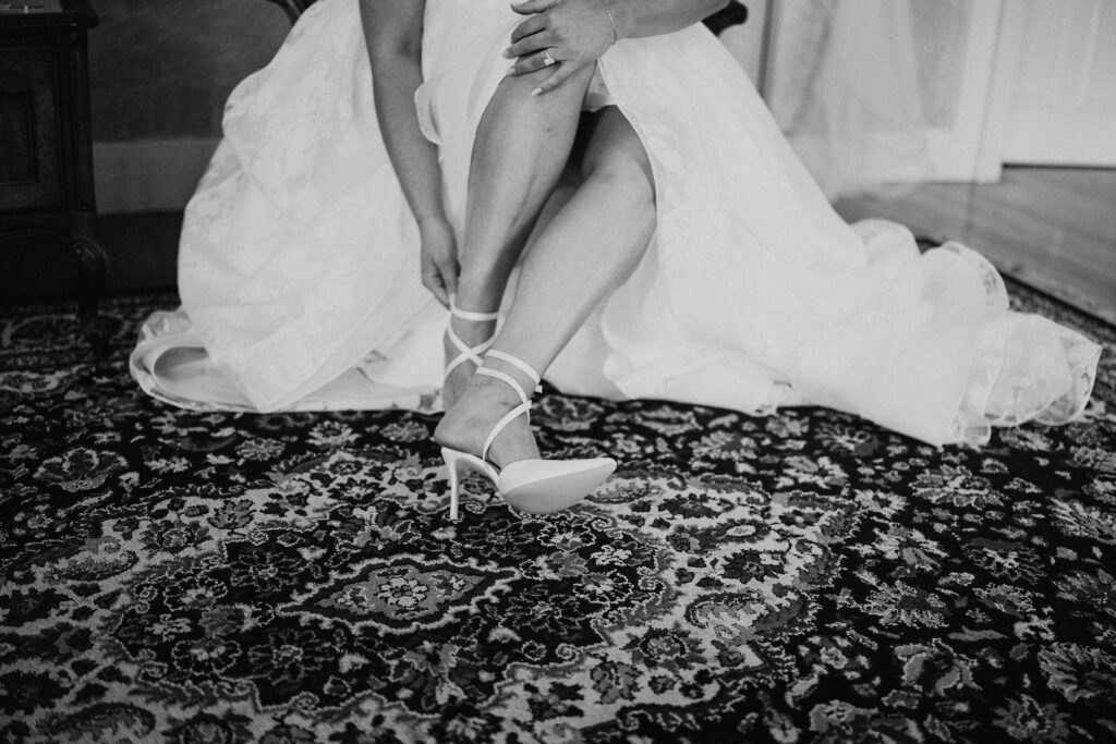 Discover Kirsten + Charlie’s romantic August wedding at Gwyn Careg Inn. Elegant details, lush florals, and timeless photography.