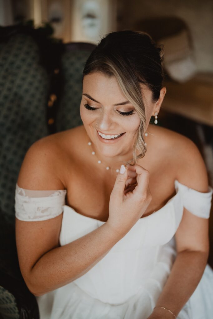 Discover Kirsten + Charlie’s romantic August wedding at Gwyn Careg Inn. Elegant details, lush florals, and timeless photography.