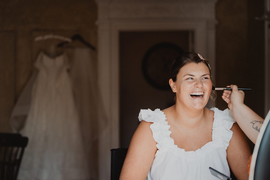 Discover Kirsten + Charlie’s romantic August wedding at Gwyn Careg Inn. Elegant details, lush florals, and timeless photography.