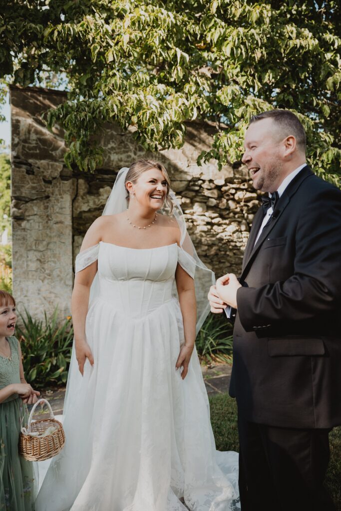 Discover Kirsten + Charlie’s romantic August wedding at Gwyn Careg Inn. Elegant details, lush florals, and timeless photography.