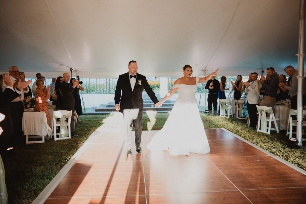 Discover Kirsten + Charlie’s romantic August wedding at Gwyn Careg Inn. Elegant details, lush florals, and timeless photography.