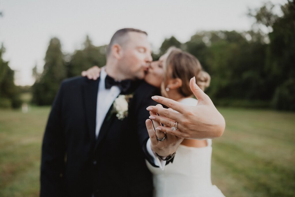Discover Kirsten + Charlie’s romantic August wedding at Gwyn Careg Inn. Elegant details, lush florals, and timeless photography.