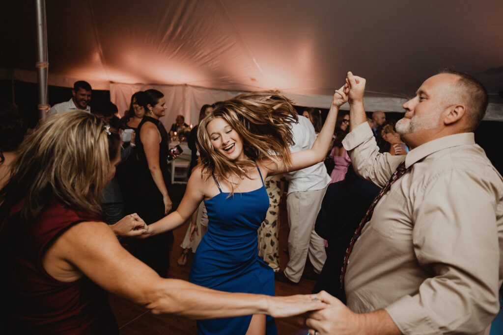 Discover Kirsten + Charlie’s romantic August wedding at Gwyn Careg Inn. Elegant details, lush florals, and timeless photography.