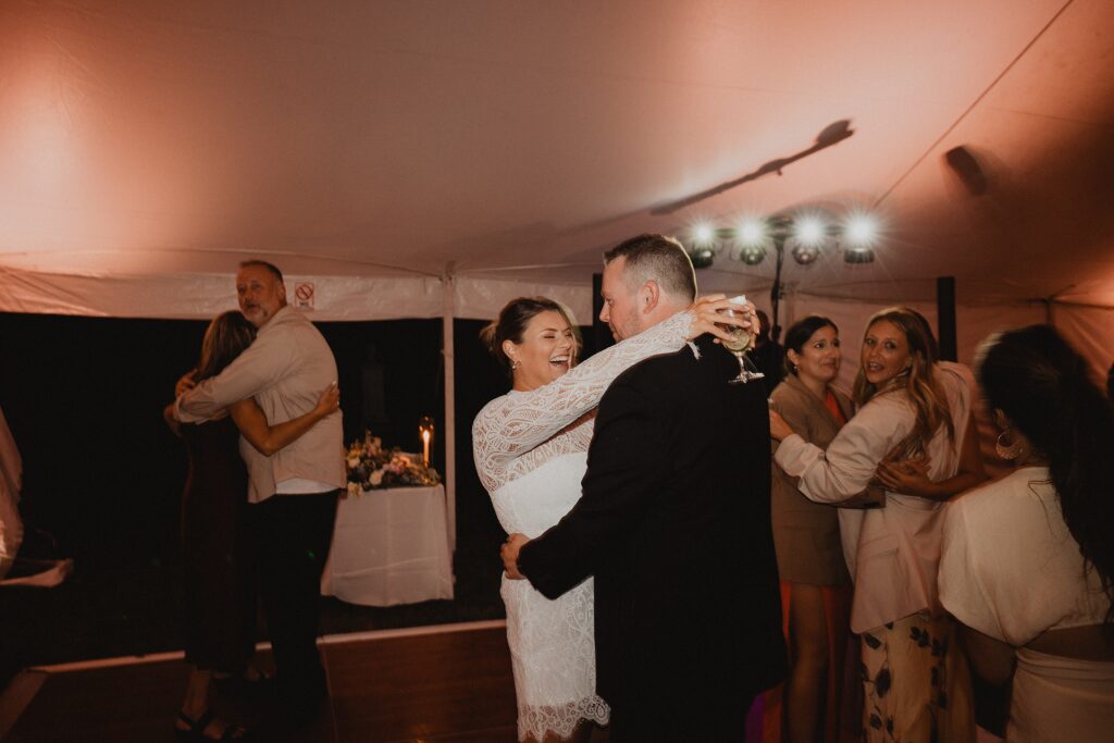 Discover Kirsten + Charlie’s romantic August wedding at Gwyn Careg Inn. Elegant details, lush florals, and timeless photography.