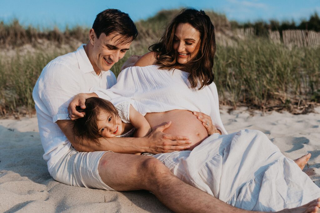 Trendy Cape Cod Maternity Photos on the Beach at Sunset