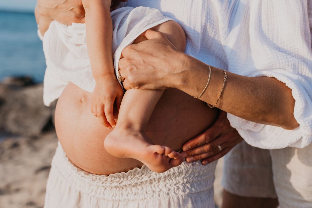 Trendy Cape Cod Maternity Photos on the Beach at Sunset