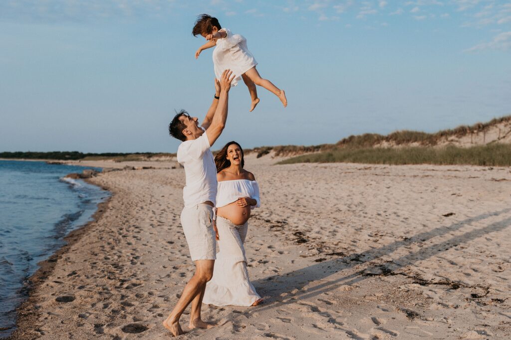 Trendy Cape Cod Maternity Photos on the Beach at Sunset