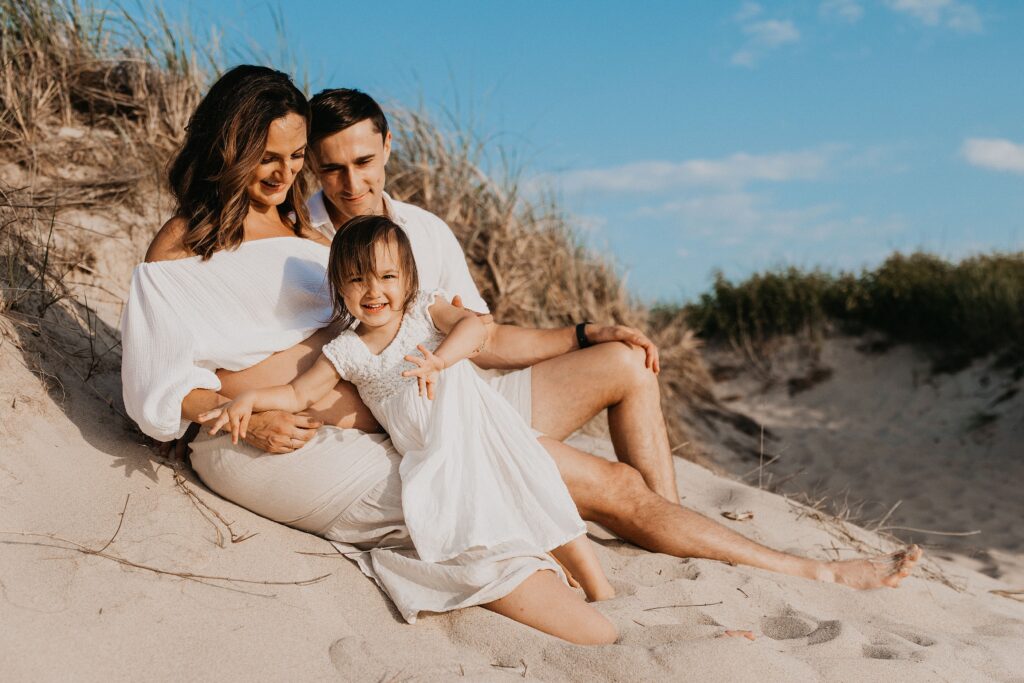 Trendy Cape Cod Maternity Photos on the Beach at Sunset