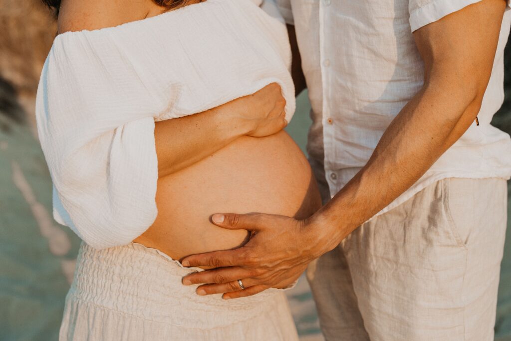 Trendy Cape Cod Maternity Photos on the Beach at Sunset